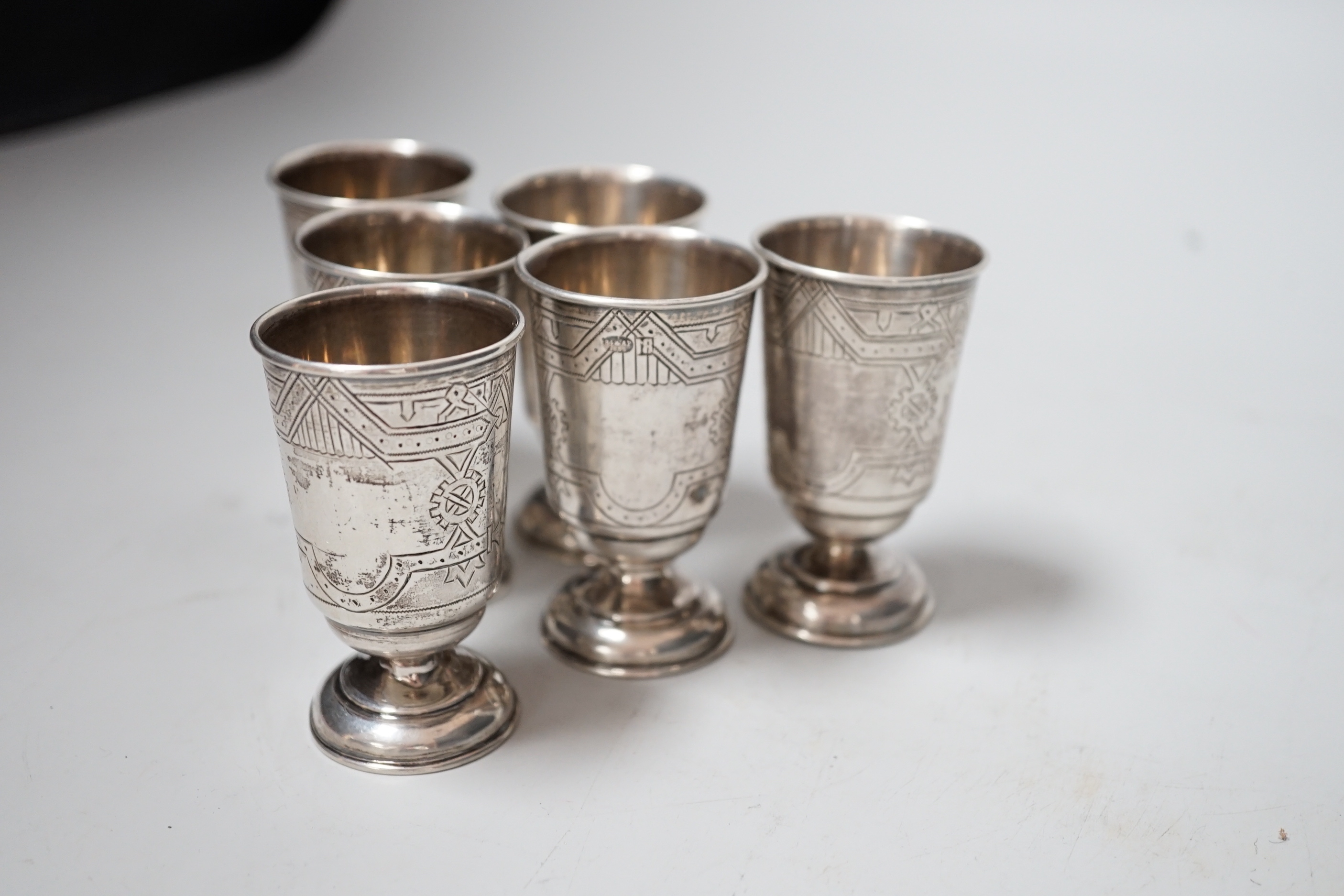A set of six late 19th century Russian 84 zolotnik white metal pedestal tots, 65mm, 6.1oz.